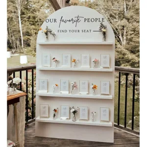 Wooden Wedding Seating Display Wall with Tiered Shelves and Table Cards for Outdoor Garden Ceremonies